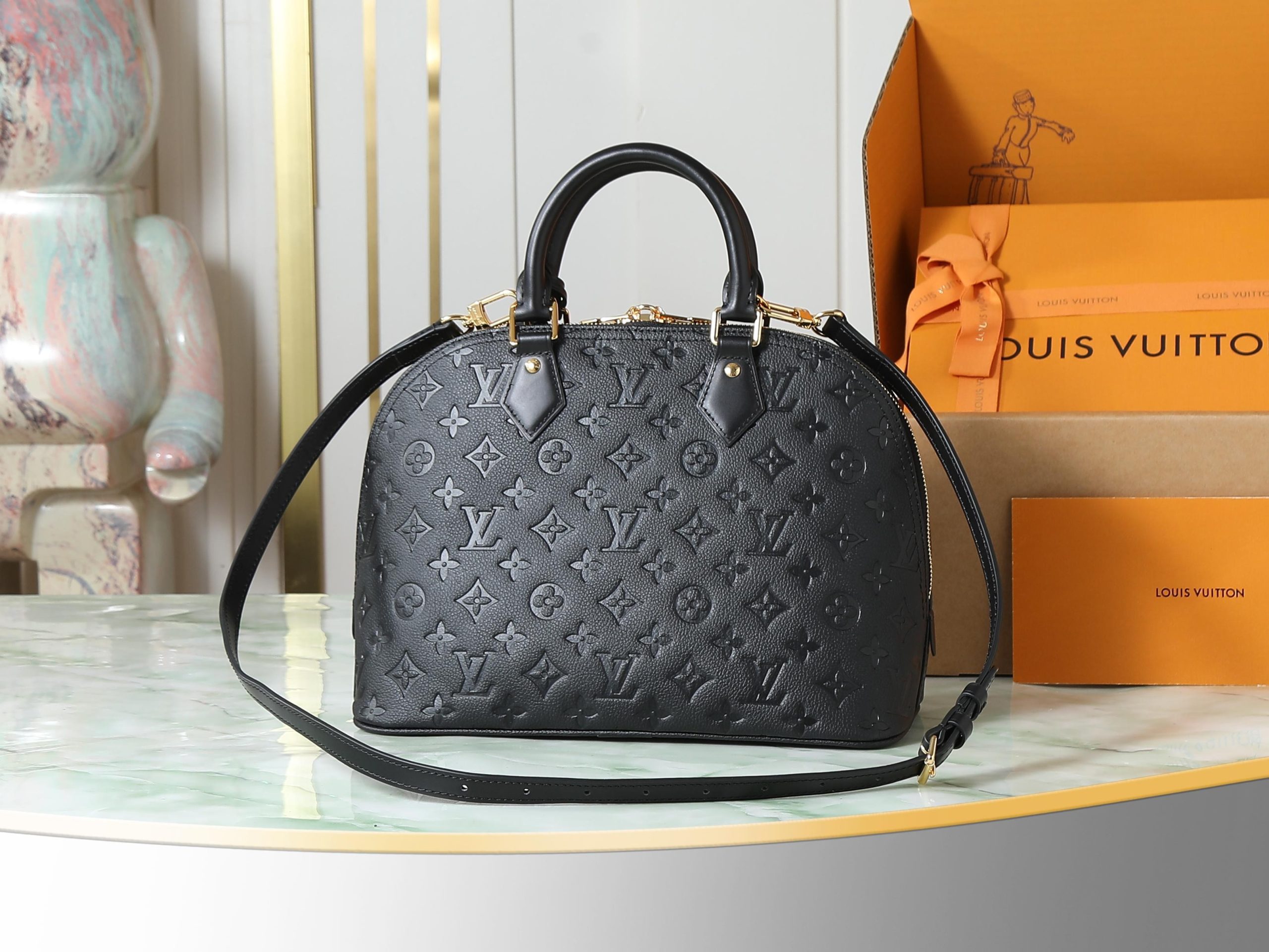 Bolso Alma PM de Louis Vuitton en piel Monogram Empreinte color negro